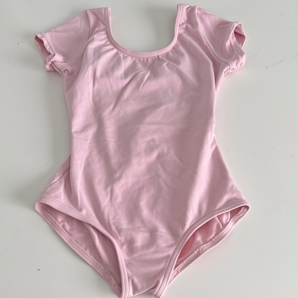 Capezio Light Pink Kids Ballet leotard. Cap sleeves. Full bottom. Lined. Size I